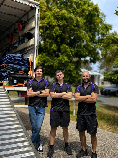 SwiftMove crew beside the truck in Brisbane